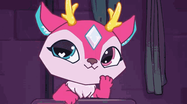 a pink deer with antlers and a diamond on its forehead