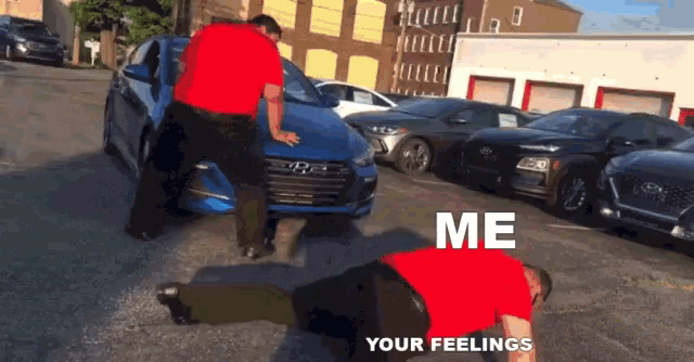 a man in a red shirt is doing push ups in front of a blue car with the words " me your feelings "