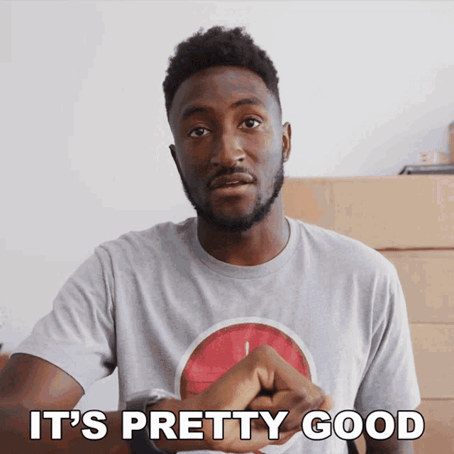 a man in a gray shirt says " it 's pretty good "