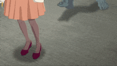 a woman in a pink dress is standing next to a werewolf 's feet