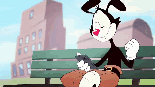 a cartoon character is sitting on a bench looking at a phone