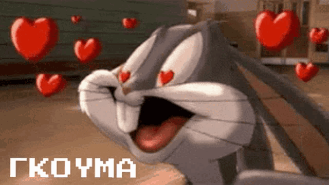 bugs bunny from looney tunes is surrounded by hearts and says " gkouma " on the bottom
