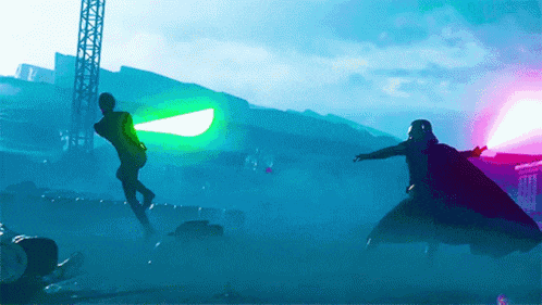 a man is holding a green light while another man is holding a black light