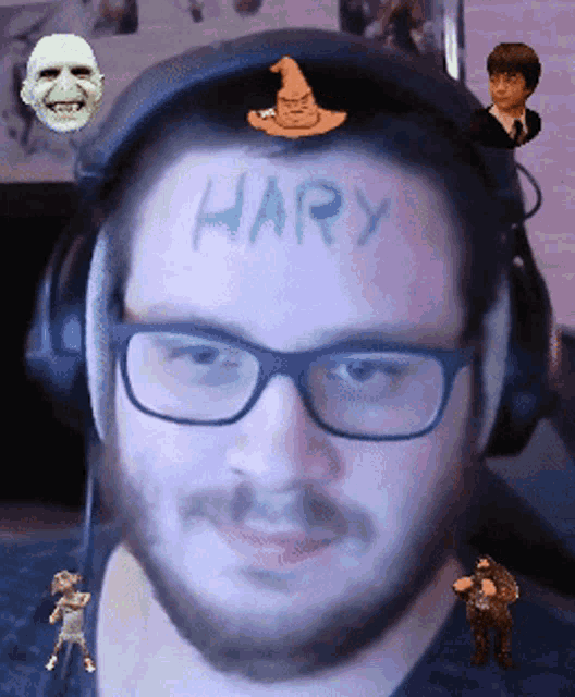 a man with glasses and a beard has the word harry written on his forehead