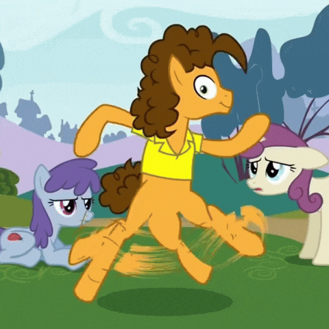 a cartoon pony with curly hair and a yellow shirt is running with two other ponies