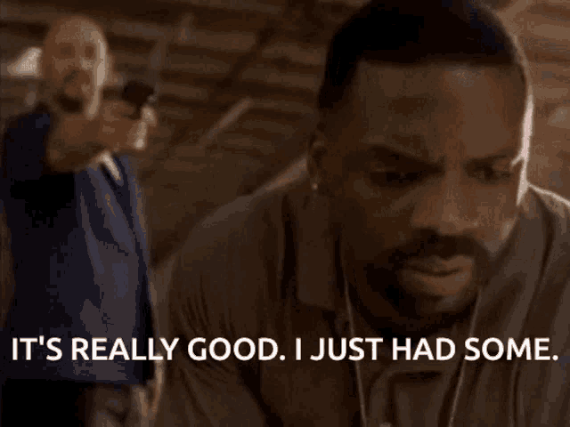 a man says it 's really good i just had some in front of another man pointing a gun