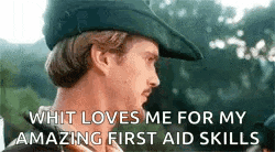 a man wearing a green hat and a mustache is talking about first aid skills .