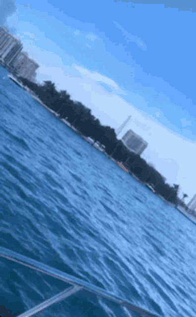 a boat is floating on a body of water