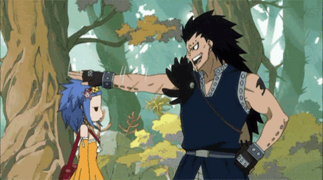 a man with a tattoo on his arm is standing next to a little girl