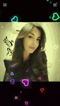 a woman 's face is surrounded by hearts and the letters m and x