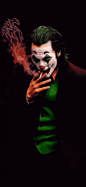 a joker is smoking a cigarette in a dark room