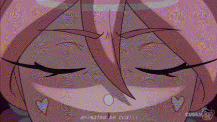 a close up of a girl 's eyes with a heart in them .