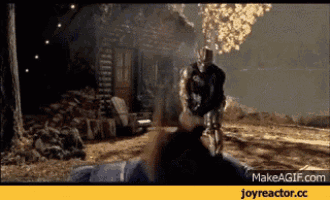 a man in a mask is standing in front of a cabin holding a gun ..