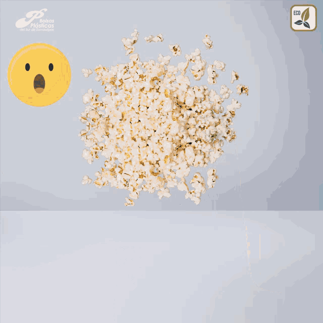 a bag of popcorn with a surprised face next to a sign that says eco