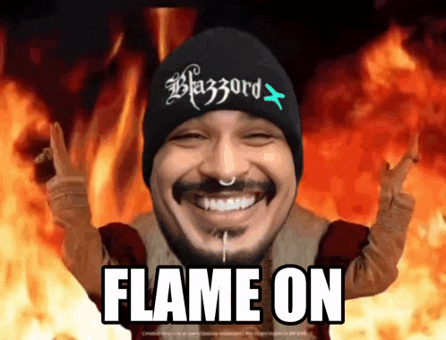 a man wearing a black beanie that says blazzard