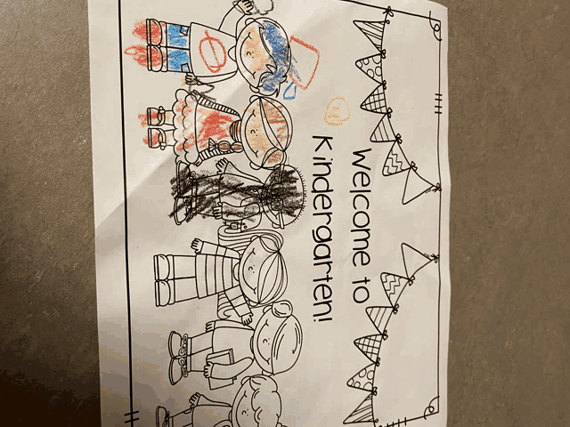a child 's drawing says welcome to kindergarten on it