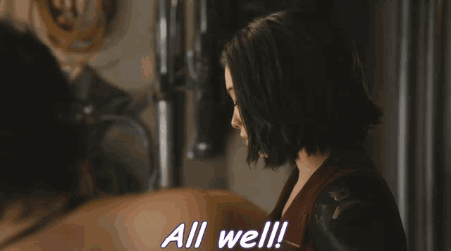 a woman says " all well " while looking at another person