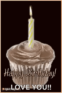 a cupcake with a lit candle on top of it and the words `` happy birthday ! love you ! ''
