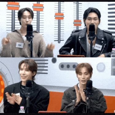 a group of young men are standing in front of microphones and one of them has a name tag that says rui on it