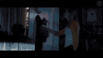 a pixelated image of a boy laying on a bed