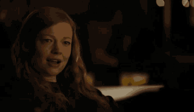 a woman in a dark room says i tried playing with you and you broke