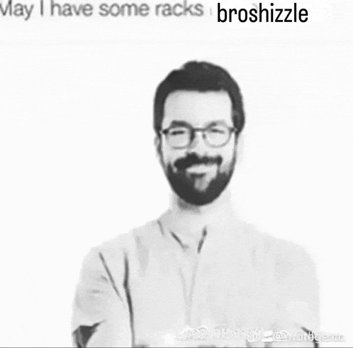 a man with a beard and glasses is standing with his arms crossed and the caption may i have some racks broshizzle