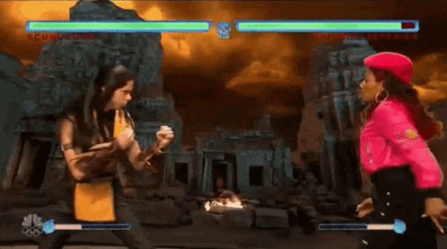 two women are fighting in a video game and one of them is pointing at the other and says " no "