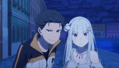 a boy and a girl are standing next to each other and the girl has a necklace with purple stones