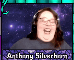 anthony silverhorn is wearing headphones and smiling