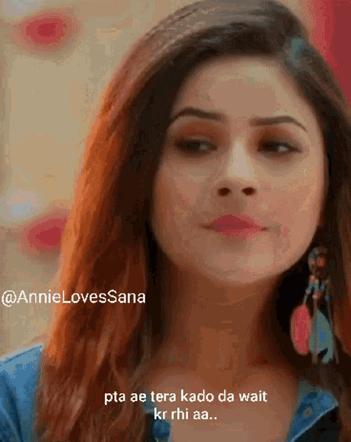 a close up of a woman 's face with the words " pta ae tera kado da wait kr rhi aa "