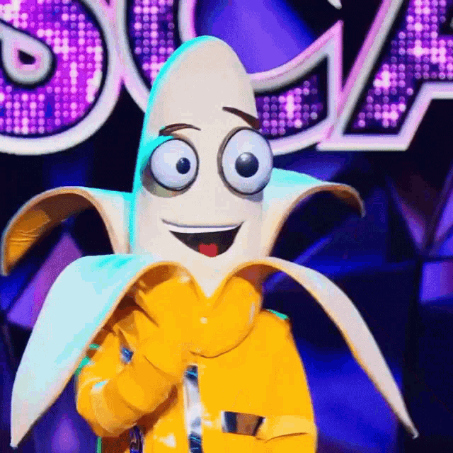 a person dressed as a banana with big eyes