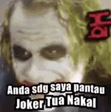 a picture of the joker with a caption that says `` anda sdg saya pantau joker tua nakal '' .