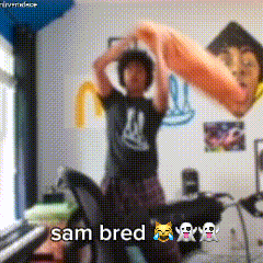 a blurry picture of a person with the words sam bred written on the bottom