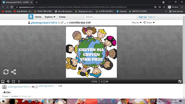 a computer screen shows a cartoon of people around a globe with the words chuyên dia chuyên vĩnh phúc
