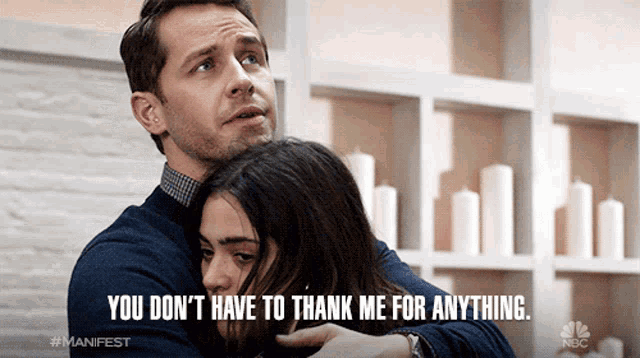 a man hugging a woman with the words " you don 't have to thank me for anything "