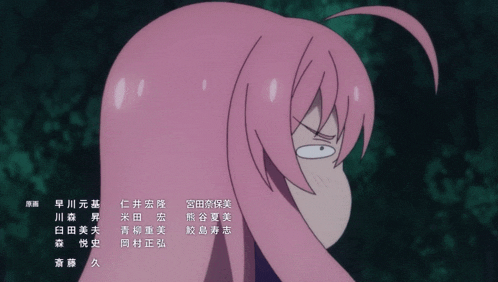 a girl with pink hair is making a funny face in a foreign language