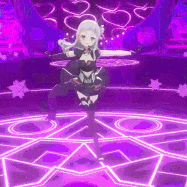 a girl is dancing on a stage in a video game .