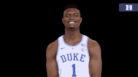 a duke basketball player is smiling and wearing number 1