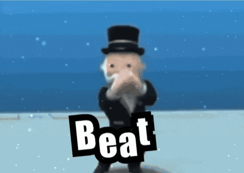 a man in a top hat is dancing with the word beat behind him