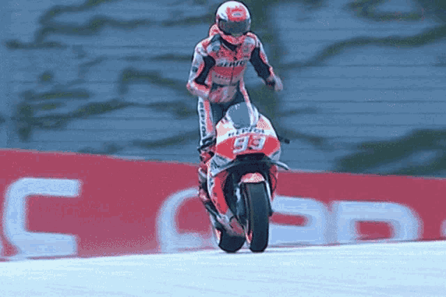 a man riding a motorcycle with the number 39 on the front