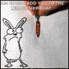 a cartoon rabbit is standing next to a carrot that is being drawn by a person .