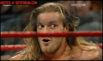 a man in a wrestling ring with the words hosted at gifsforum.com below him