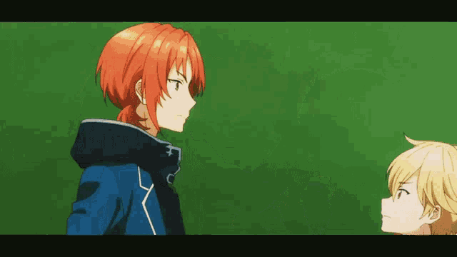 a boy with red hair is standing next to a boy with blonde hair