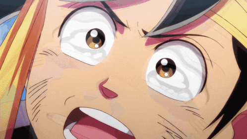 a close up of a cartoon character 's face with big eyes