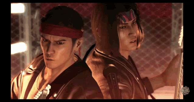 two men are standing next to each other with one wearing a red headband