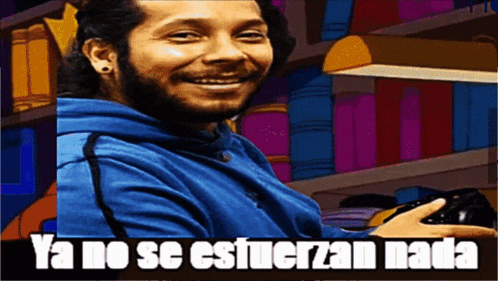 a man with a beard is smiling and holding a video game controller with the words ya no se estuerzan nada written below him