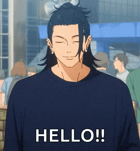 a man in a blue shirt is standing in front of a crowd and saying `` hello '' .