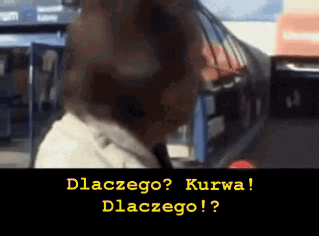 a blurry picture of a man with the words dlaczego kurwa and dlaczego