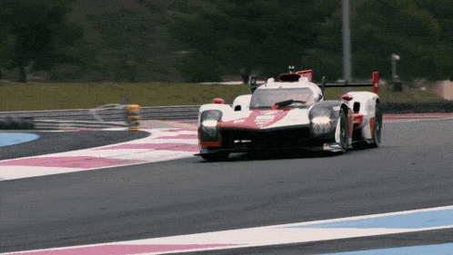 a toyota race car is on a race track