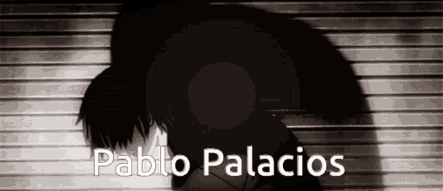 a black and white photo of pablo palacios with a shadow